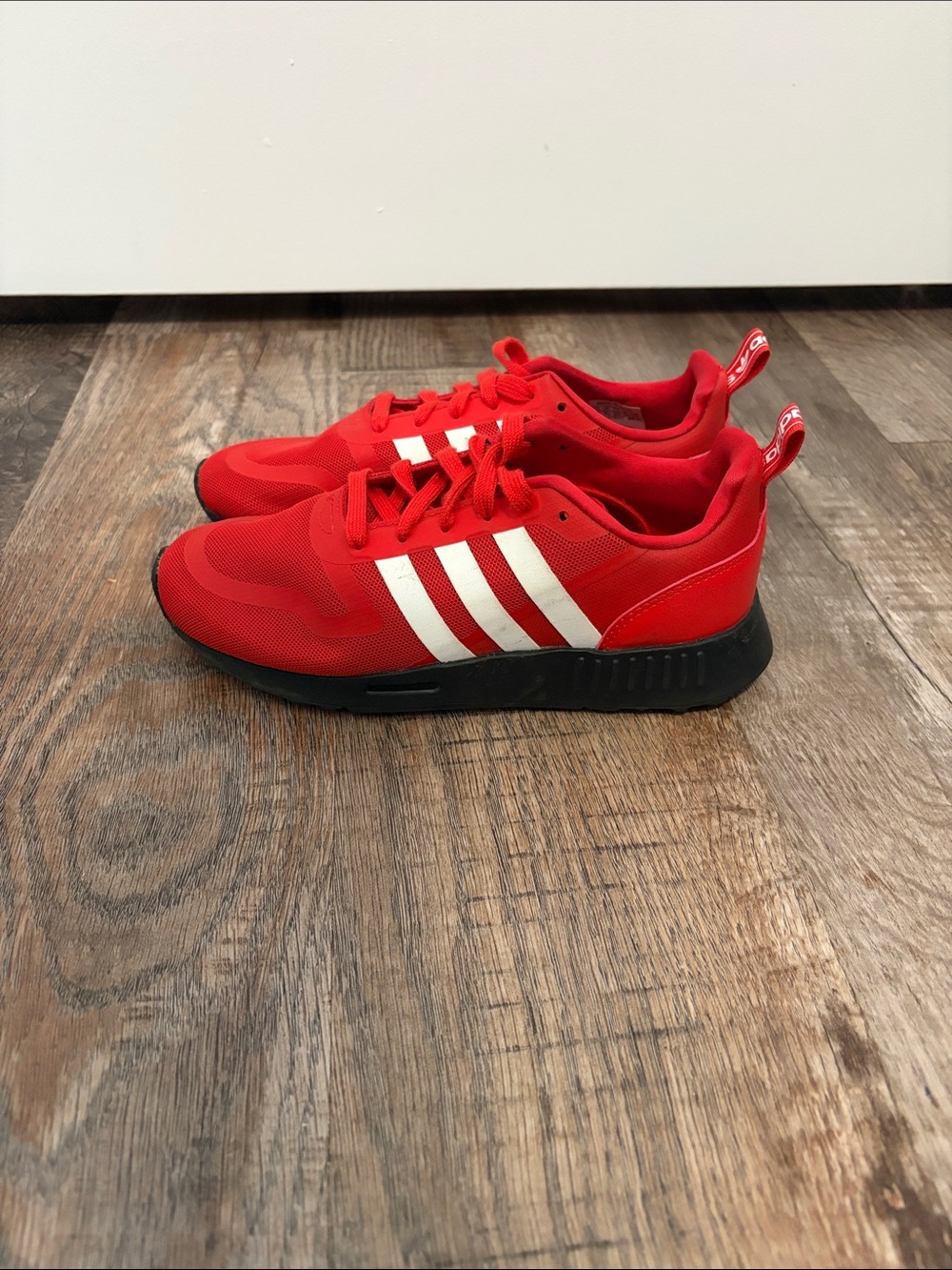 adidas Kids Red Sneakers with White Stripes